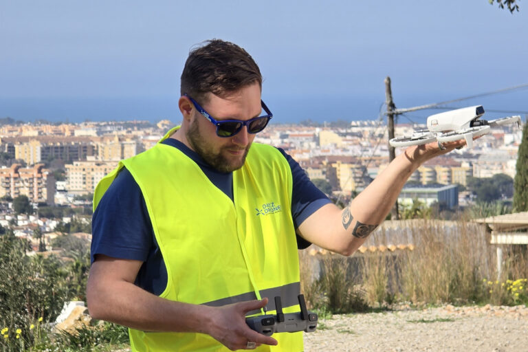Drone pilot shooting cinematic aerial video footage