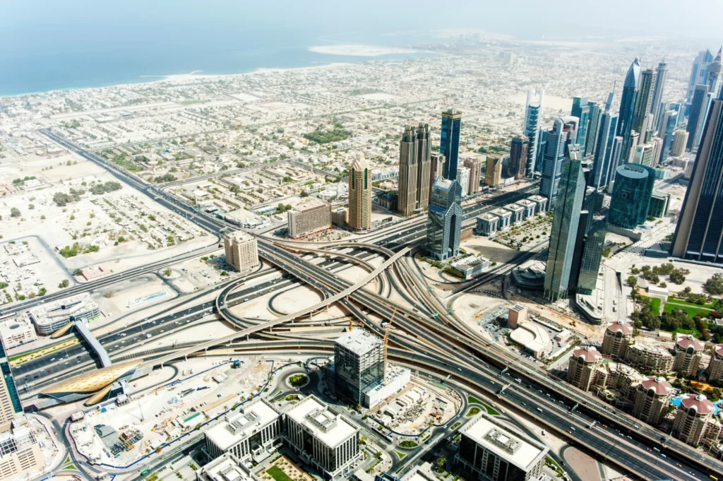 Drone pilots photographing modern architecture from above