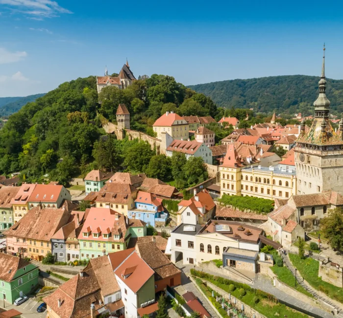 aerial-drone-view-sighisoara-old-city-romania-mures-county aerial-drone-view-sighisoara-old-city-romania-mures-county