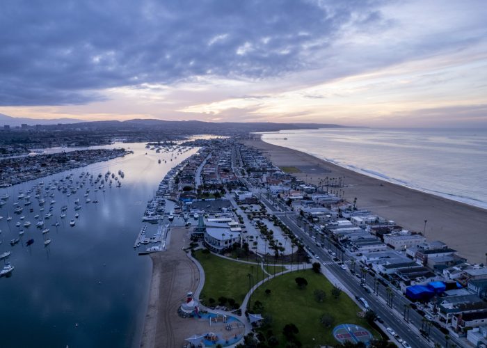 An aerial view of Newport Beach in California during sunset