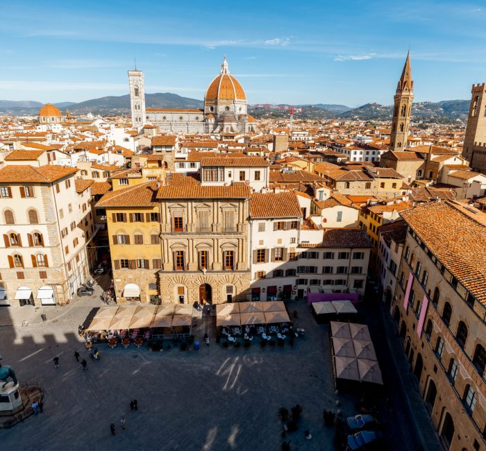 Aerial view on the old town of Florence with famous Duomo cathedral on skyline Aerial view on the old town of Florence with famous Duomo cathedral on skyline on sunny day. Outstanding cityscape of tuscany. View from Vecchio palace