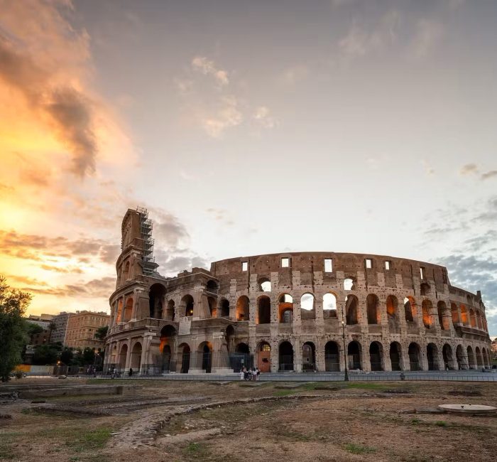 Sunrise/Sunset Colosseum View | Rome, Italy | Dazz Drones Service Iconic Colosseum in Rome, Italy, bathed in sunrise or sunset light, representing historical landmark photography services by Dazz Drones in Italy.
