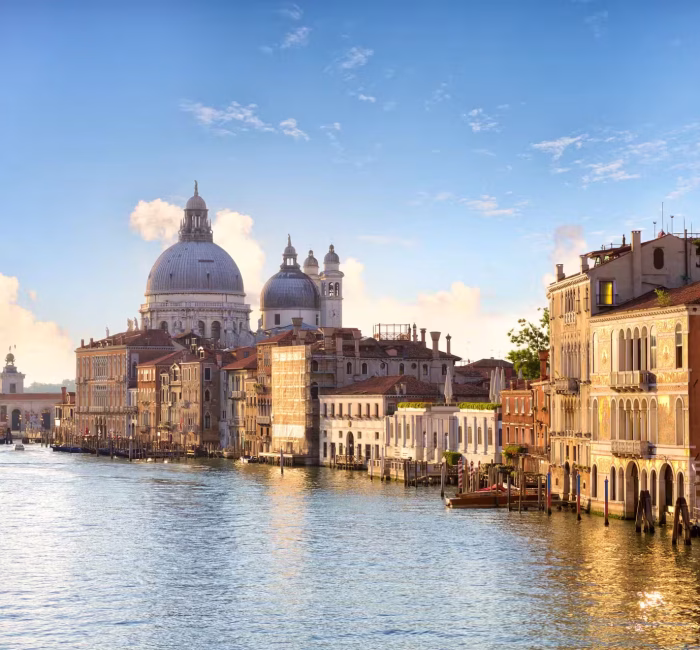 Grand Canal & Basilica Santa Maria della Salute View | Venice, Italy | Dazz Drones View along the Grand Canal towards the Basilica di Santa Maria della Salute in Venice, Italy, showcasing iconic cityscape photography by Dazz Drones.