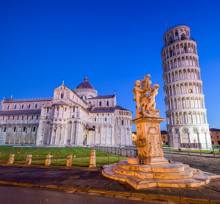 Leaning Tower of Pisa in Italy in the Square of Miracles PISA, ITALY - DECEMBER 17, 2021: The Leaning Tower of Pisa in the Square of Miracles at twilight.