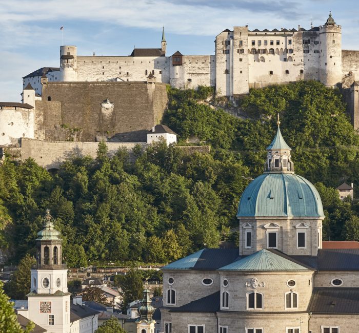 PIcturesque Hohensalzburg fortress and Salzburg cathedral skylin Historic Hohensalzburg fortress and Salzburg cathedral cityscape. Salzburg, Austria